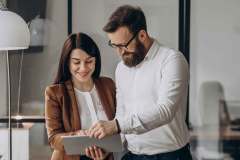 Two business partners working in office